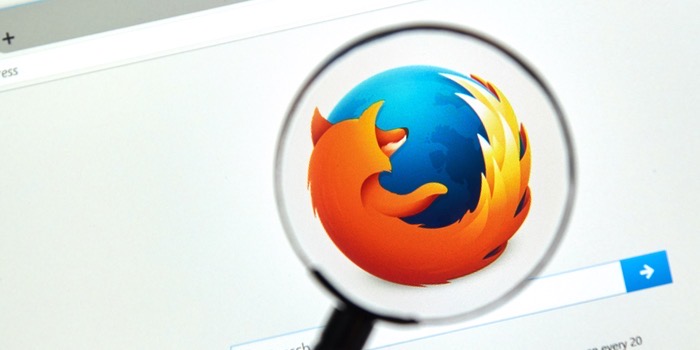 Magnifying glass pointed at the Firefox logo